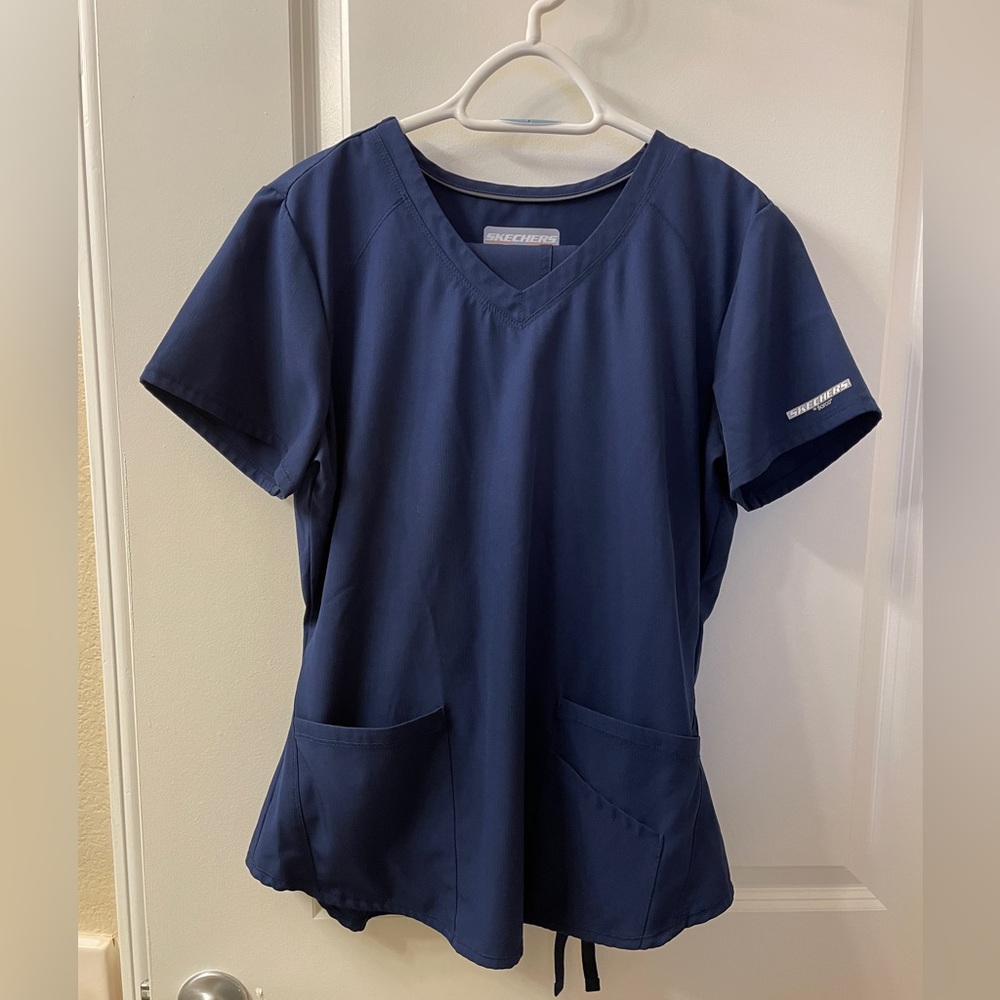 Scrubs - four sets of scrubs. Size Medium.